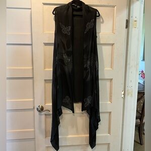 Black batik high low sleeveless duster with butterflies and leaves. One size.